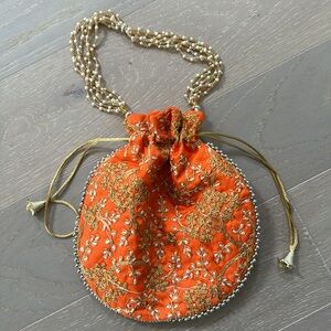 Indian style purse with pearl beaded handle
